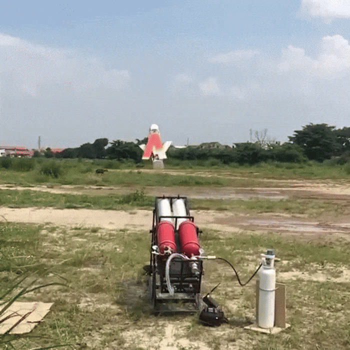 The UAV launching from the pneumatic tube and deploying its wings